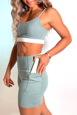 BYO ACTIVE - OUTSAGEOUS CRISS CROSS BRA IN SAGE GREEN